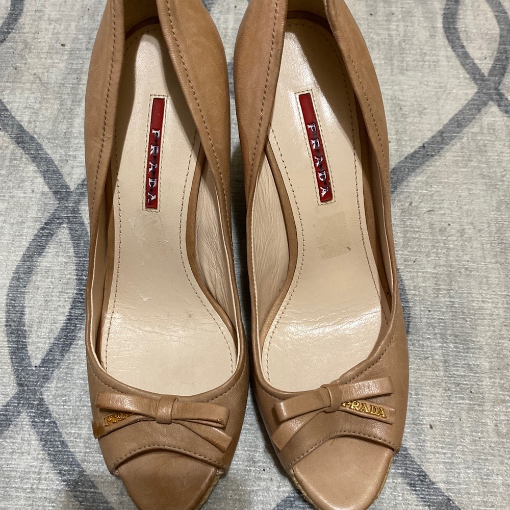 Light pink Prada leather wedges